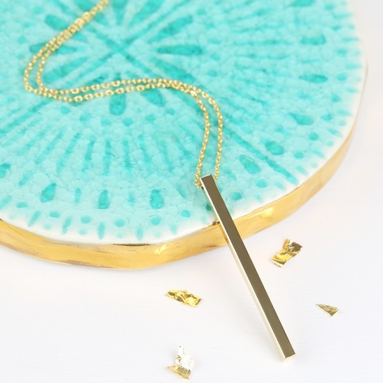 A gold bar necklace