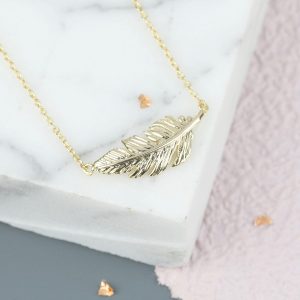 Gold feather necklace