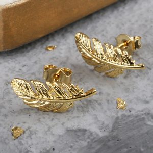 Gold feather earrings