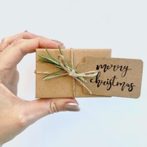 Twine with fresh rosemary and personalised gift tag